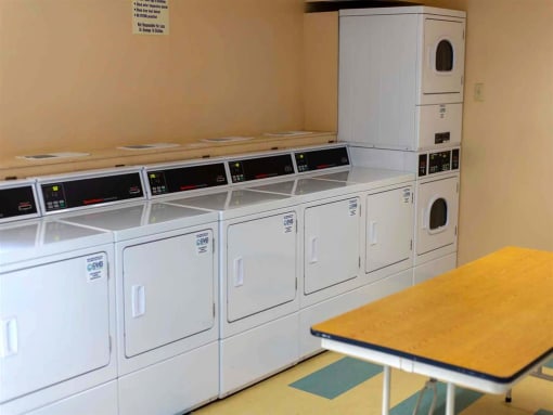 On-site laundry room offering added convenience for residents of College Parkway Place, an Enterprise community providing quality housing and supportive services.