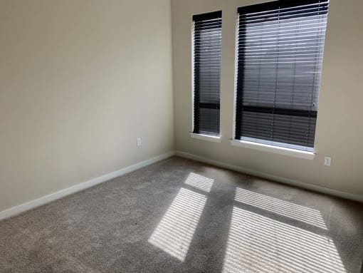 Spacious bedrooms with plenty of natural light at Metro Heights apartment community near downtown Baltimore.