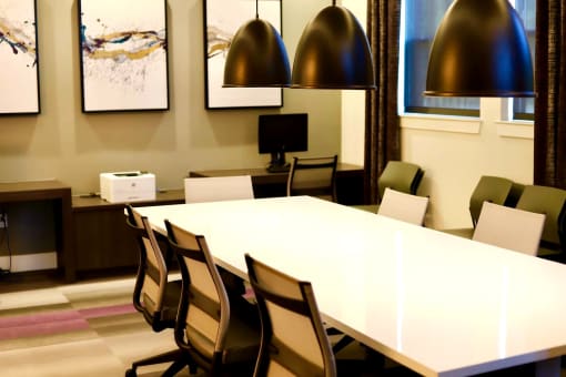 Pet-friendly and smoke-free, Metro Heights community amenities include a fitness center, business center, media room, playground, bike storage, and underground parking—perfect for urban, connected living near downtown Baltimore.