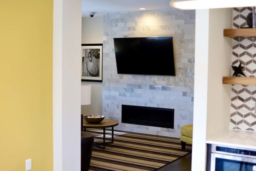 Pet-friendly and smoke-free, Metro Heights community amenities include a fitness center, business center, media room, playground, bike storage, and underground parking—perfect for urban, connected living near downtown Baltimore.