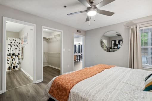 Master bedroom with closet at The Hartley at Sweetwater Creek, Duluth, GA