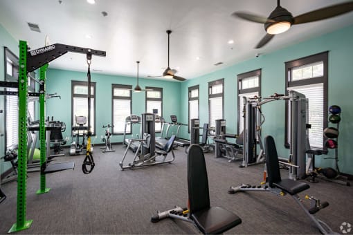 the gym at the flats at big tex apartments at Grand Oak at Town Park, Smyrna, Tennessee