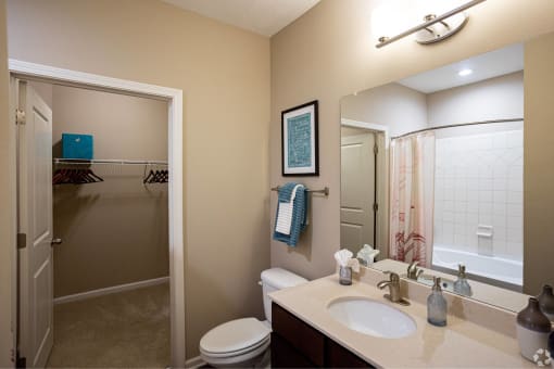 a bathroom with a sink and a toilet and a shower at Grand Oak at Town Park, Smyrna, Tennessee
