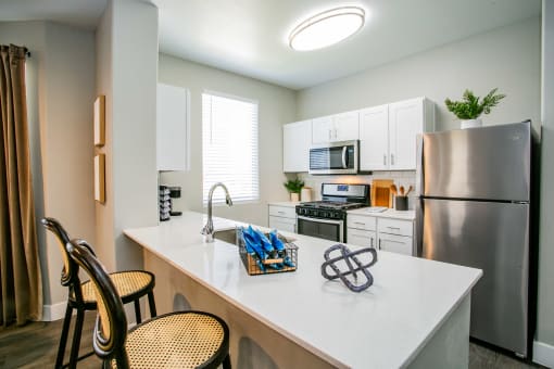 Octave Apartments Kitchen with stainless steel appliances
