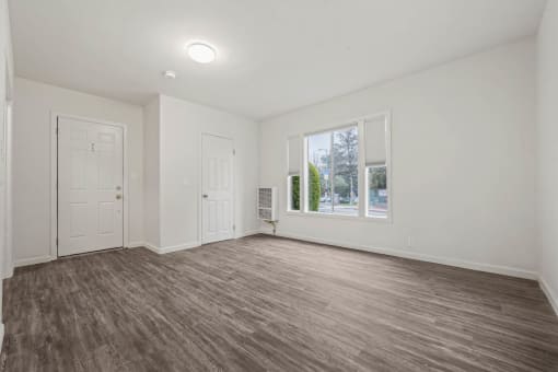 Room with ceiling lights at Beverly Boulevard Apartments, Los Angeles