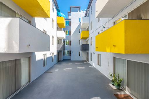 view of walkway between buildings