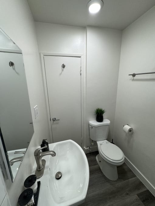 a small bathroom with a toilet and a sink