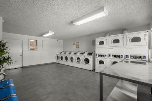 Rows of washers and dryers for laundry at Sunset Square, West Covina, 91790