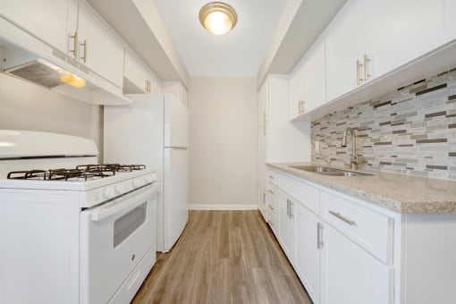 open kitchen and living room at Sunset Square Apartments, West Covina, California, 91790