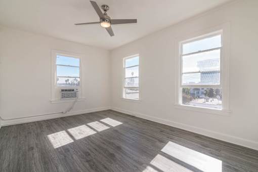 Living area with 3 large windows