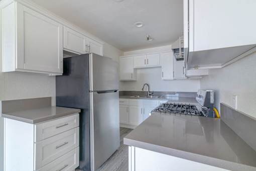 a kitchen and living room in a 1130 Marine unit