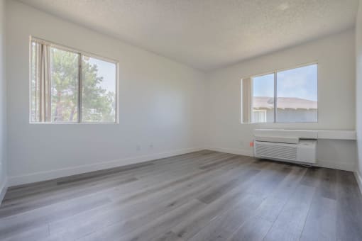 Bright room with wood like flooring at Monterra Ridge Apartments, California,91351