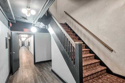 Staircase and open ceiling view