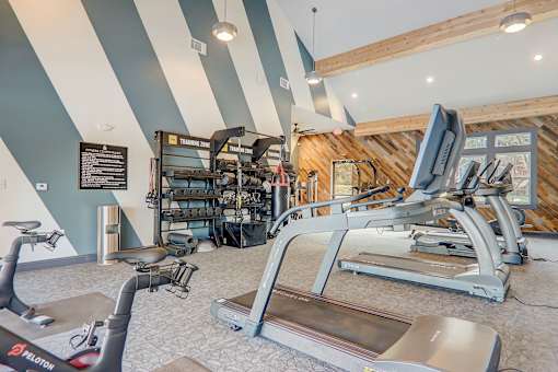1-Bedroom Garden-Style Apartments In Weaverville, NC - Highline North - Fitness Center Equipped With Cardio Machines, Weights, And Agility Area