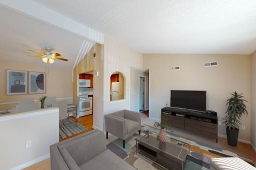 a living room with a couch and a tv