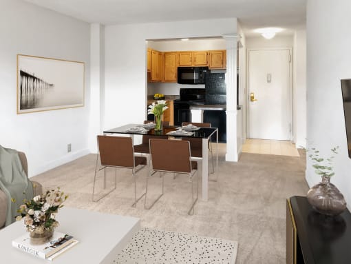 a living room with a dining room table and a kitchen
