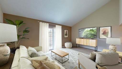 A living room with a large couch, a coffee table, and a lamp.