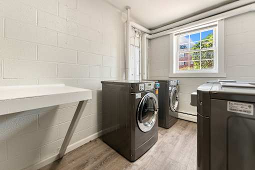 A laundry room with a washer and dryer.