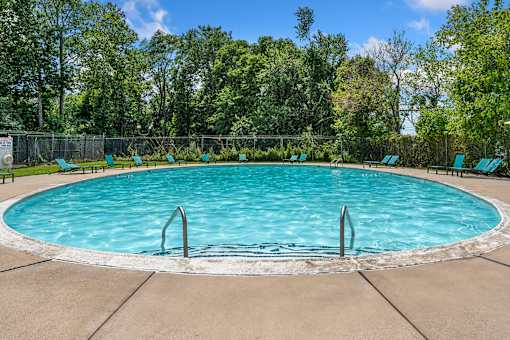 Residents enjoy a refreshing pool, fitness center, and planned community events.