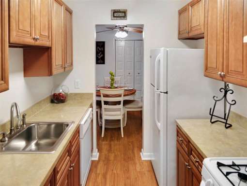 Kitchens provide plenty of storage and spacious countertop space.