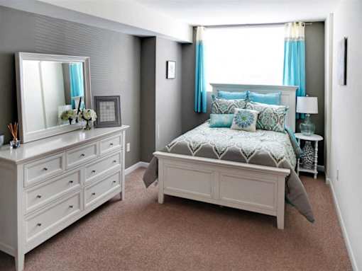 There are generous closets in every bedroom, ample space for furniture, and wall-to-wall carpeting.
