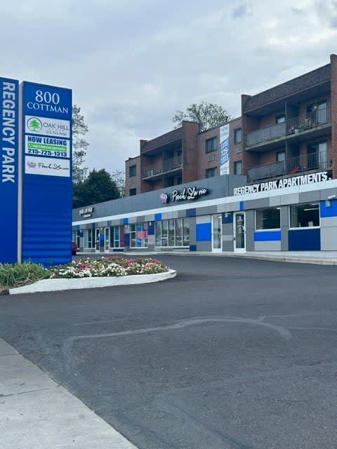 Regency Park leasing office with retail space.
