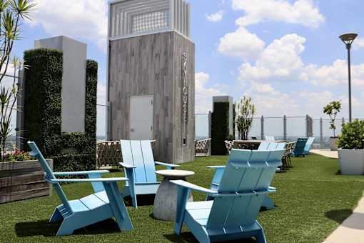 Lounge on our Sky Deck rooftop amenity.