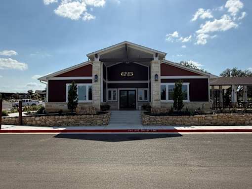 A building with a red roof and a sign that says "ARIZONA" on it.