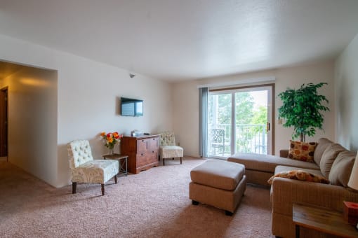 Carpeted Living Room at Custer Estates Apartments, Michigan, 48162