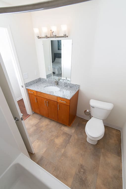 Bathroom with Vanity Lights at Gray Estates Apartments, MRD Conventional, St Clair MI 48079