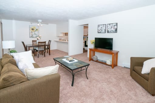 Bright Living Room With Television at Kuder Estates Apartments, MRD Conventional, Warsaw, IN, 46582