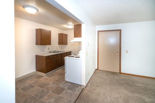 a small kitchen with a stove and a sink