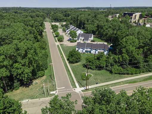 Aerial View Of Property With Surroundings at Raleigh House Apartments, MRD Apartments, East Lansing