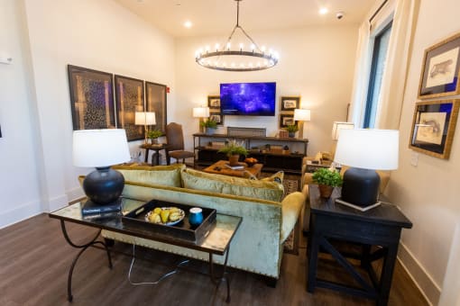 a living room with a couch and a table