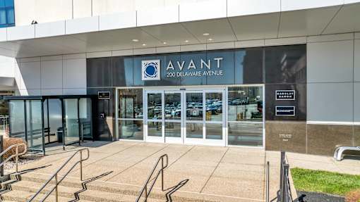 The front of a building with the name AVANT on it.