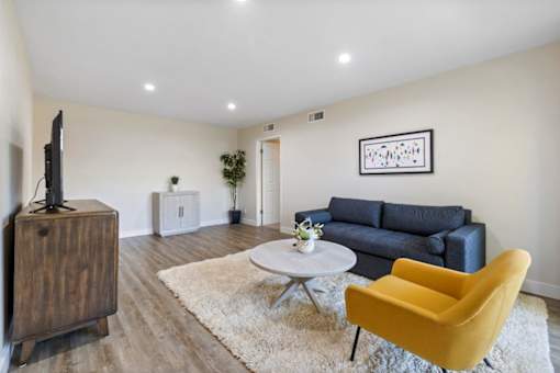 Living Room With TV at Lombardi Apartments, California, 91367