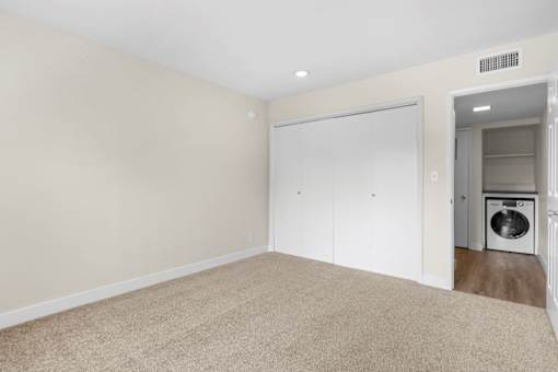 A laundry room with a washer and dryer.