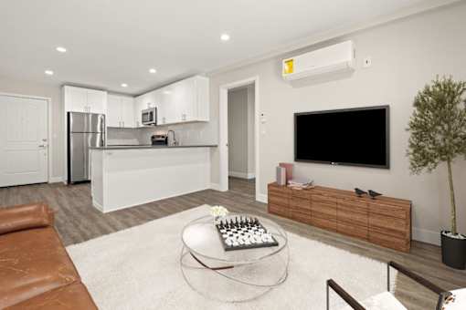 Living Room With TV at Woodland Trio Apartments, California, 91601