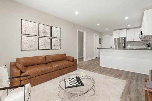 Living Area With Kitchen at Woodland Trio Apartments, California