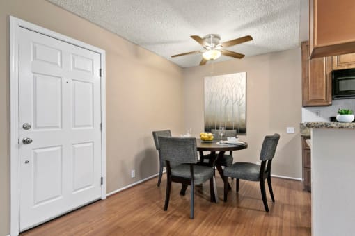Apartments for Rent in Mar Vista - Vista - Jones & Jones - Dining Area with Wood-Style Flooring and a Ceiling Fan