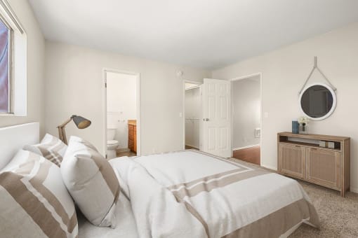 West Hills, CA Apartments For Rent - Topanga Canyon - Spacious Bedroom With Plush Carpet Flooring, Walk-In Closet, And Bathroom