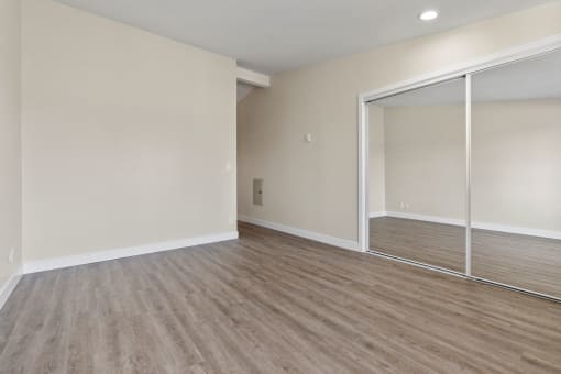 MIrrored Closets and Hardwood Flooring at Parkway Terrace Apartments, California