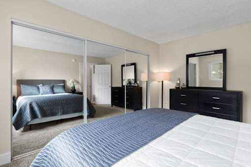 Bedroom with Mirrored Closet Doors at Casa De Marina Apartments, Los Angeles