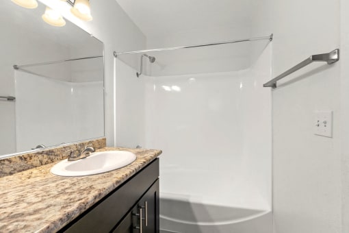Bathroom with Spacious Granite Countertop at The Meadows at Westlake Village Apartments, CA, 91361