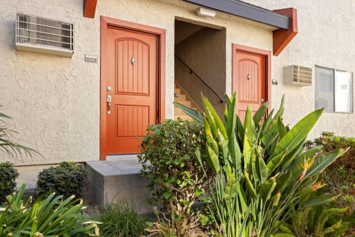 One-Bedroom Apartments In West Hills, CA - Topanga Canyon - Front Door Entrance Surrounded By Lots Of Lush Greenery