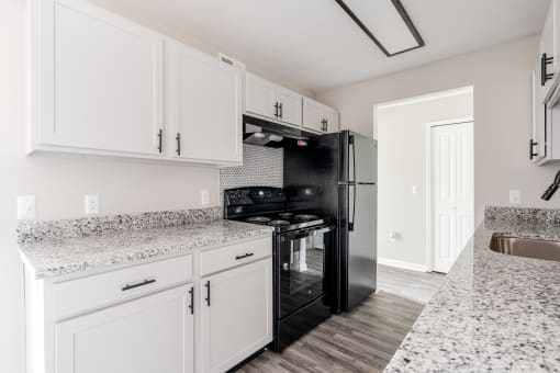 Renovated Kitchen with black appliances