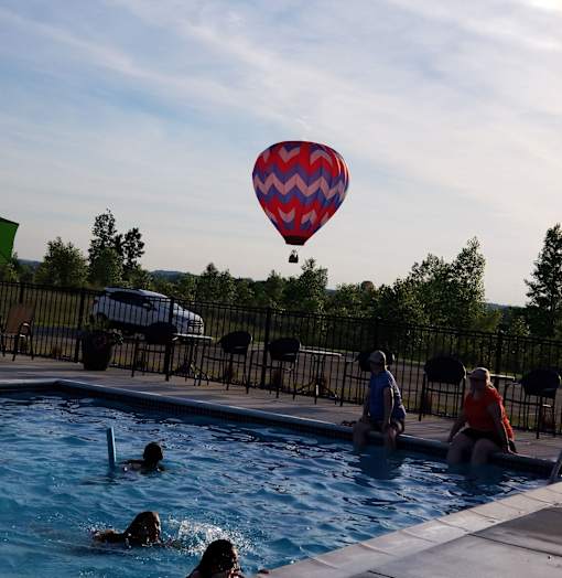 A view from the pool at Abbey Ridge Apartment Homes, Michigan