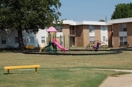 a playground in front of a building