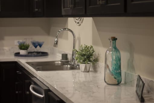 a kitchen with a sink and a window