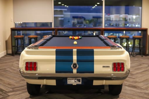 a car with a pool table on top of it at The Crossings at Redlands, California, 92374
